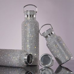 Juomapullo kahvalla ja kantohihnalla